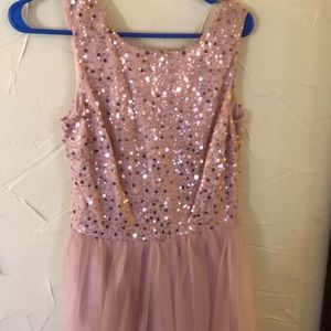 Short dress. Sequin top. Tulle bottom.